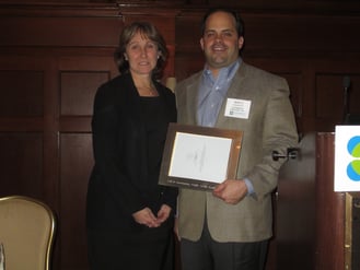Jim Boyle presents Jean Lupinacci with the 2012 Outstanding Public Sector Leader Award